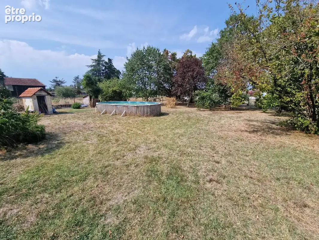 Lumlineuse maison en pierre avec grand hangar - photo 5
