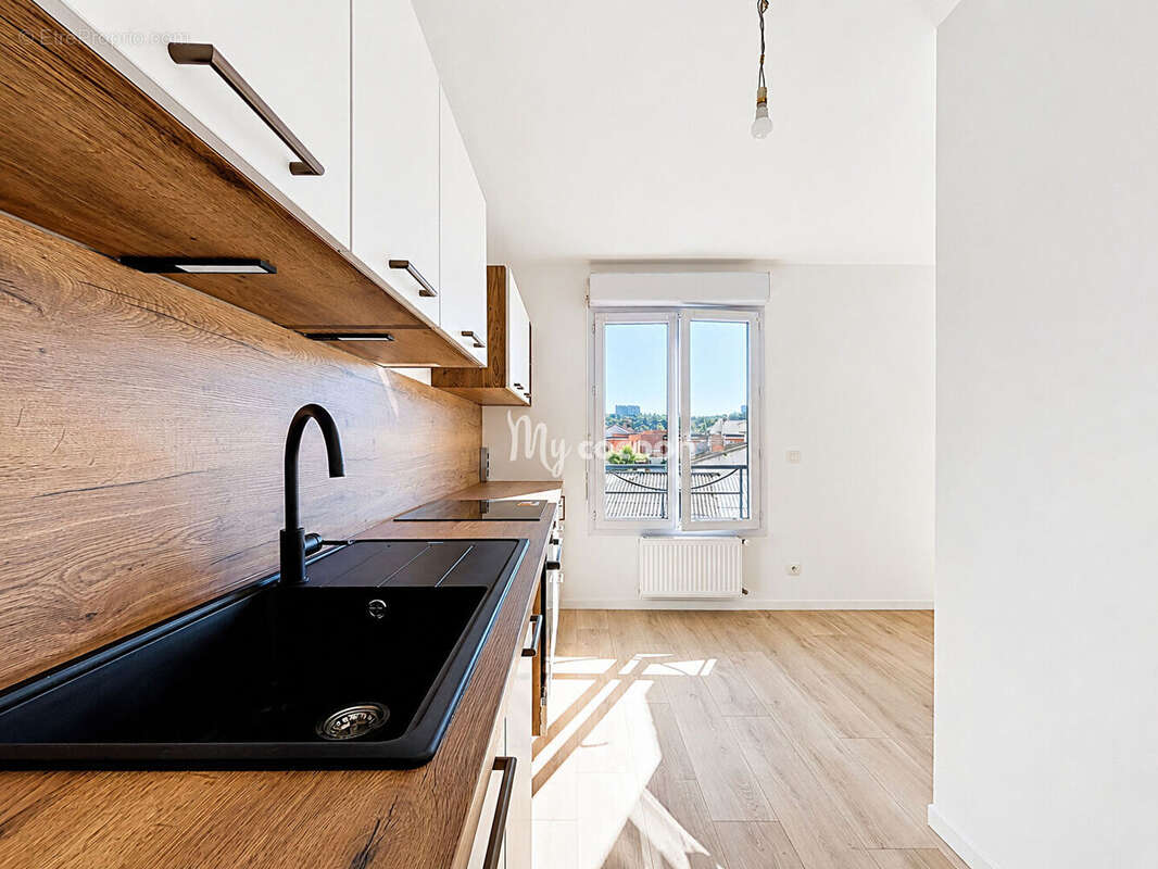 Appartement T2 - 46 m² - Cave et Garage - photo 4