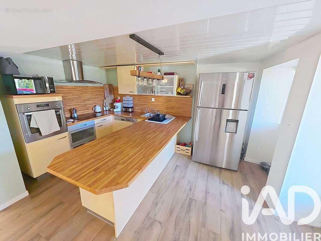 Maison 92 m² à Bouex  - photo 6