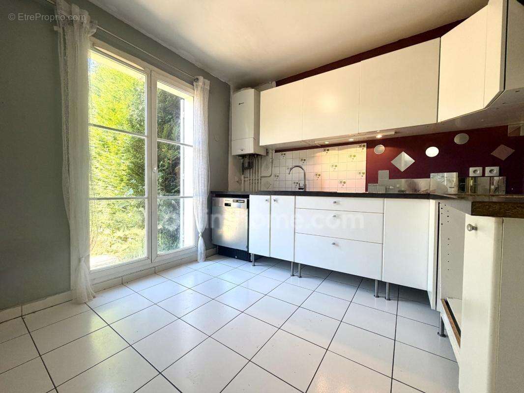 Maison 4 chambres + double garage + parking - photo 5