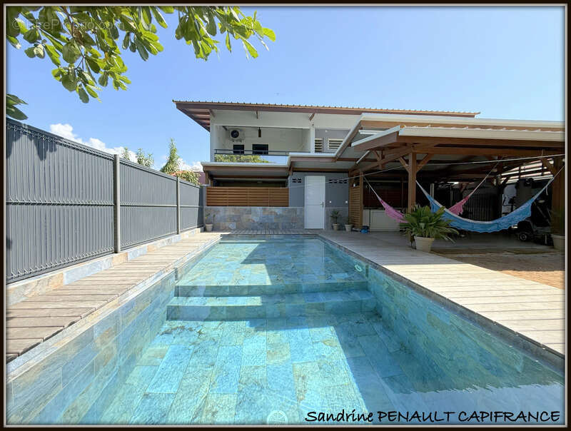 A vendre a kourou (97310) une magnifique villa t7 de 246 m² - avec 2 appartements t2 - terrain de 345 m² - au prix de 599 000 € - photo 2