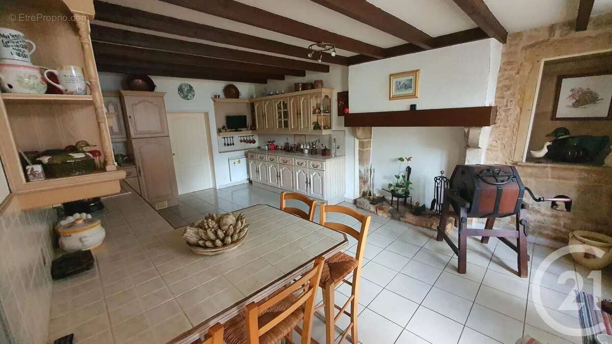Maison à AUBIGNE