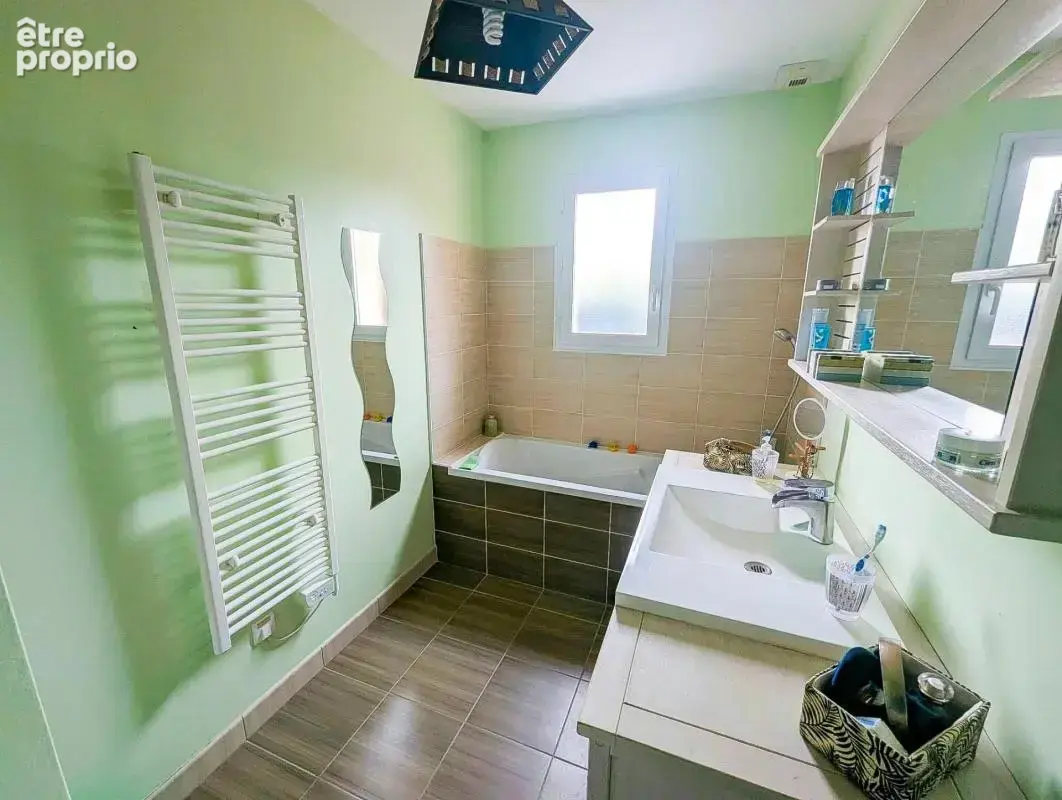 Maison de 120m² avec 4 chambres sur un terrain de 604m² - photo 7