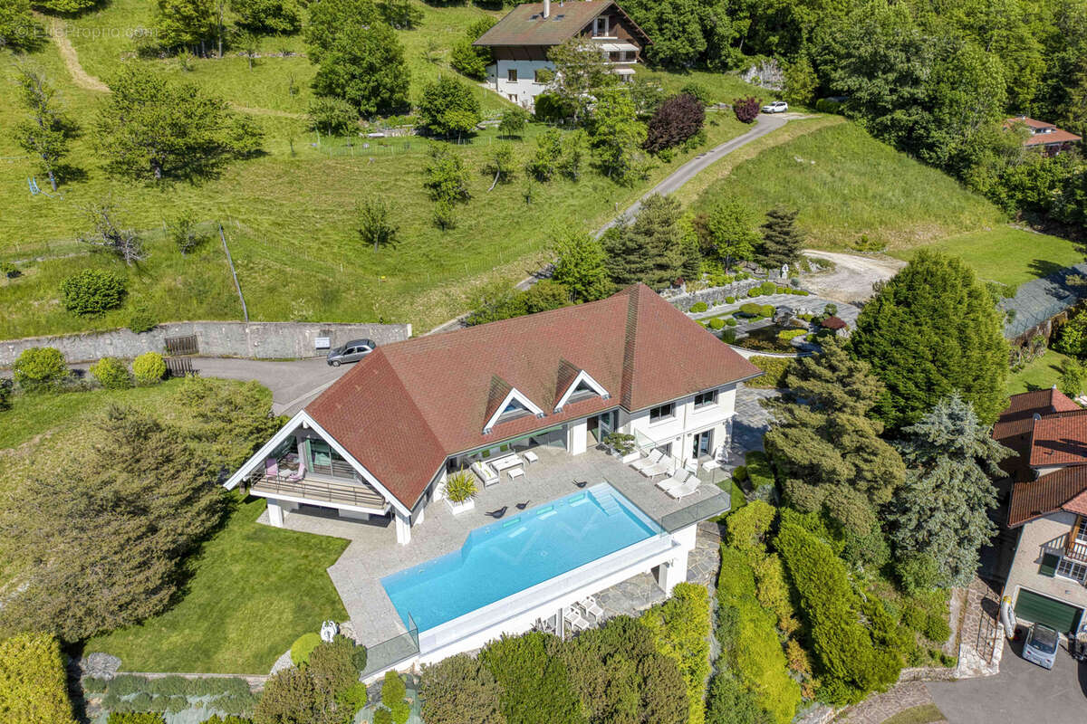 Villa d'exception dominant le lac - photo 91