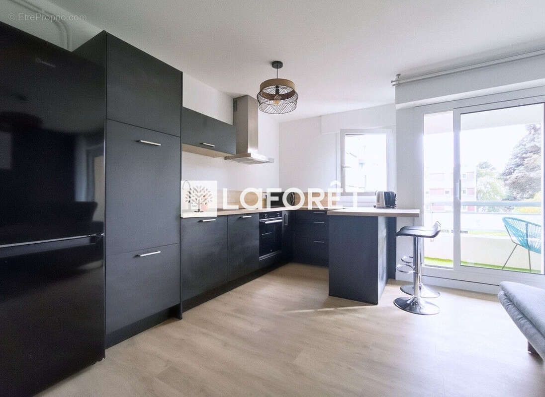 Appartement T5 rénové 4 chambres Brequigny - photo 2