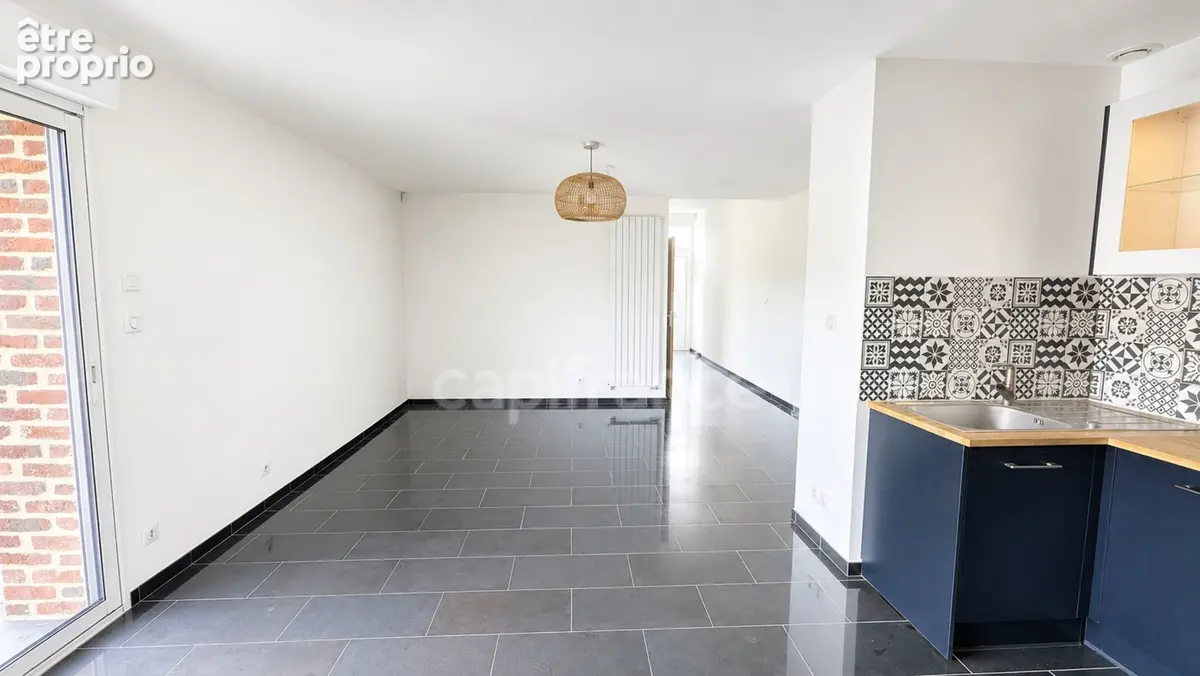 Maison semi-individuelle rénovée 104 m² – 2 chambres + bureau – Garage – Jardin – Denain - photo 3