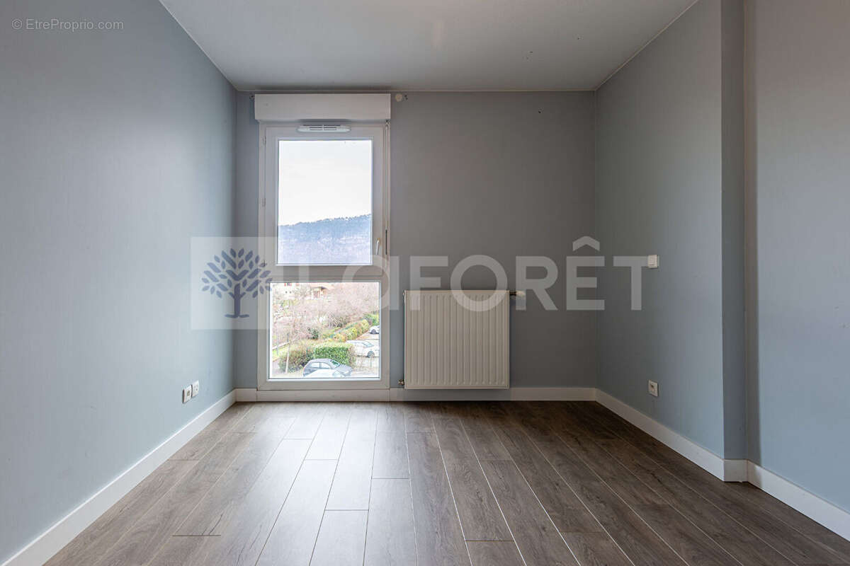 Agence immobiliere laforet - "carex" - annecy - seynod - appartement traversant t3 de 68m² - cave - balcon - photo 7