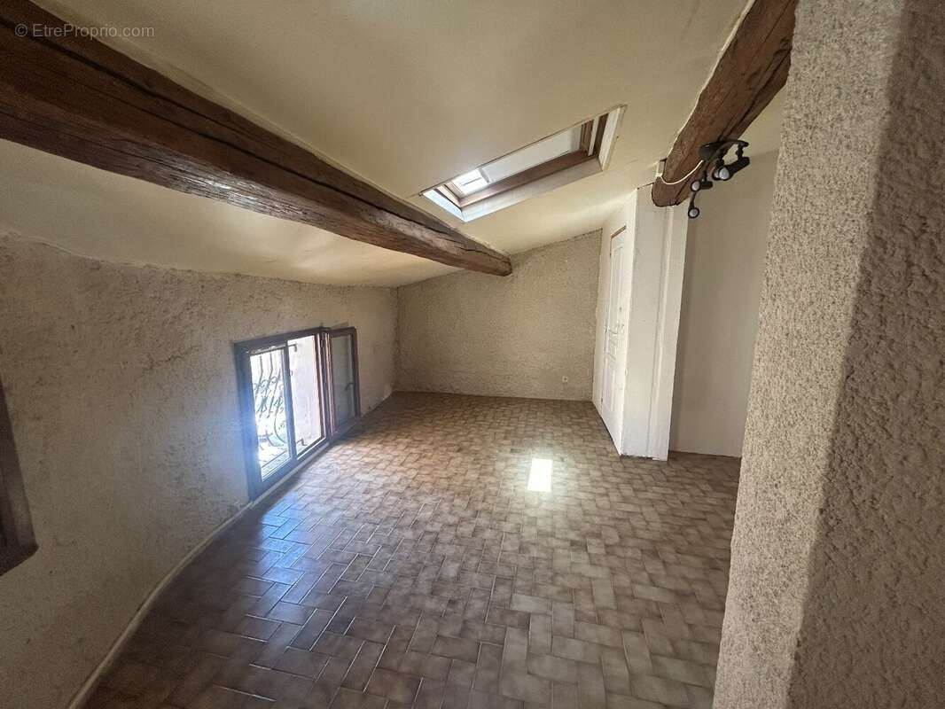 Béziers Centre  Charmante maison de ville en pierres de 63 m² - photo 4