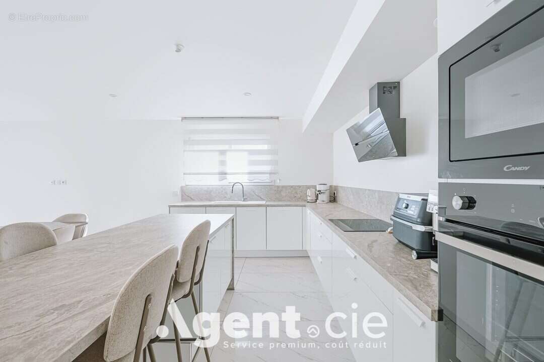 Maison 138 m² à Eterville  - photo 7
