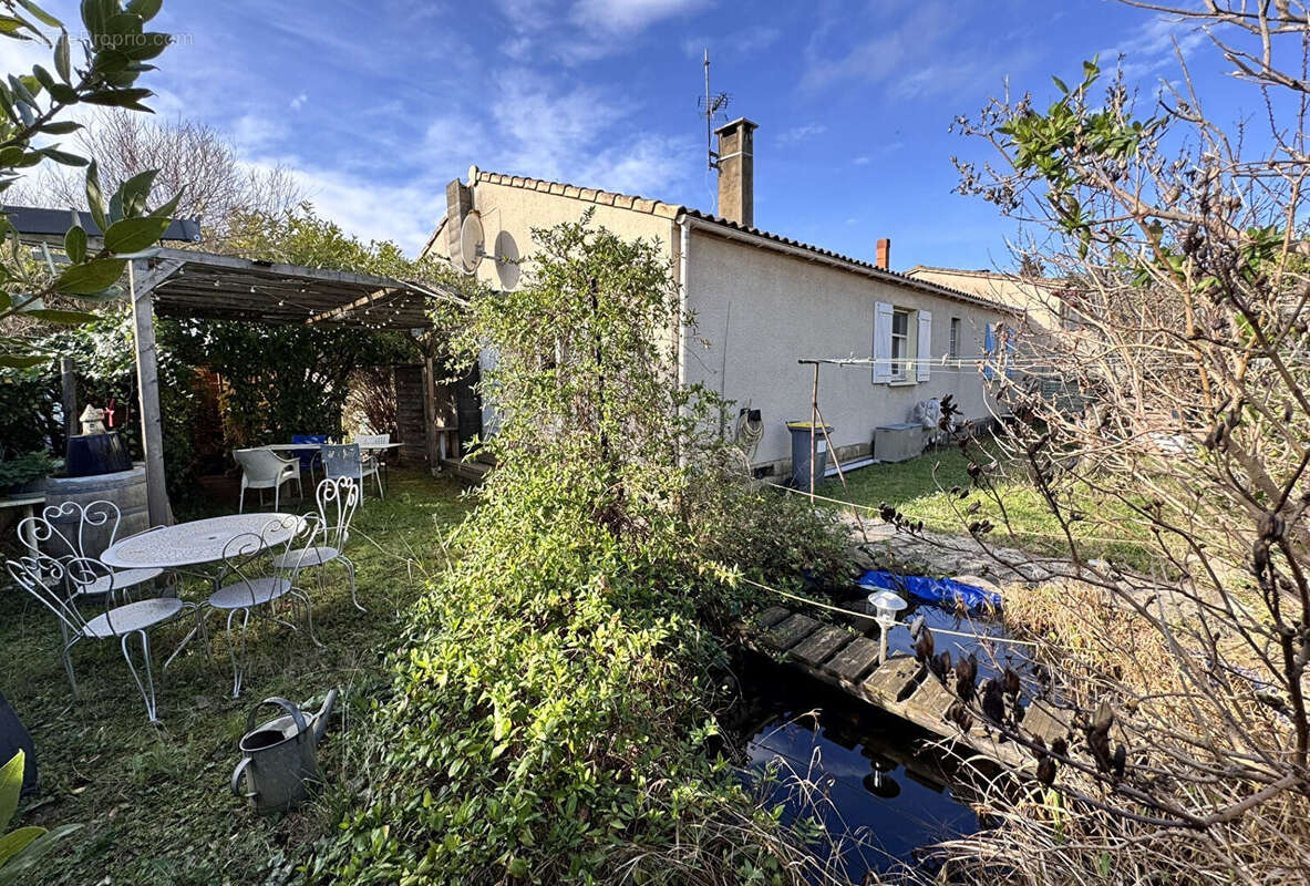 Carcassonne Grazailles pavillon plain-pied 101 m² sous-sol complet 3 chambres terrain 423 m² terrasses sans vis-à-vis cheminée i - photo 2