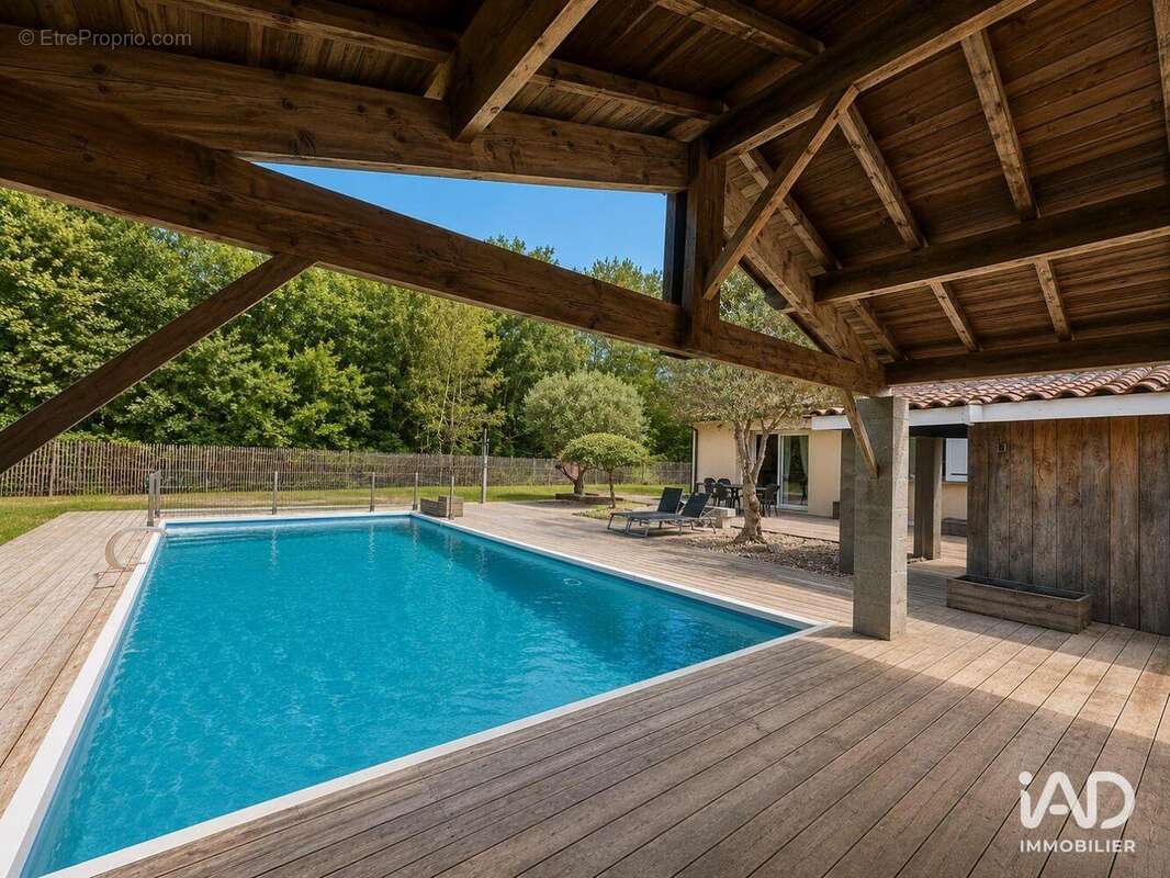 Maison 100 m² à Saugnacq-Et-Muret  - photo 2