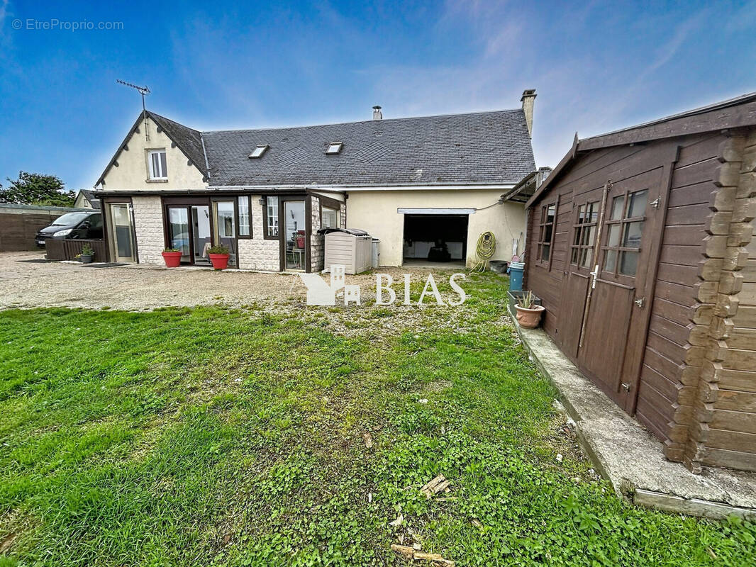 Maison à BUCHY