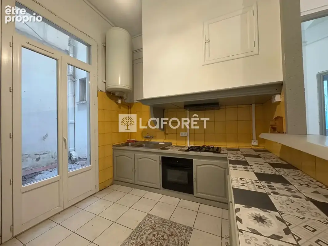 Appartement T2 rez-de-jardin centre ville - photo 7