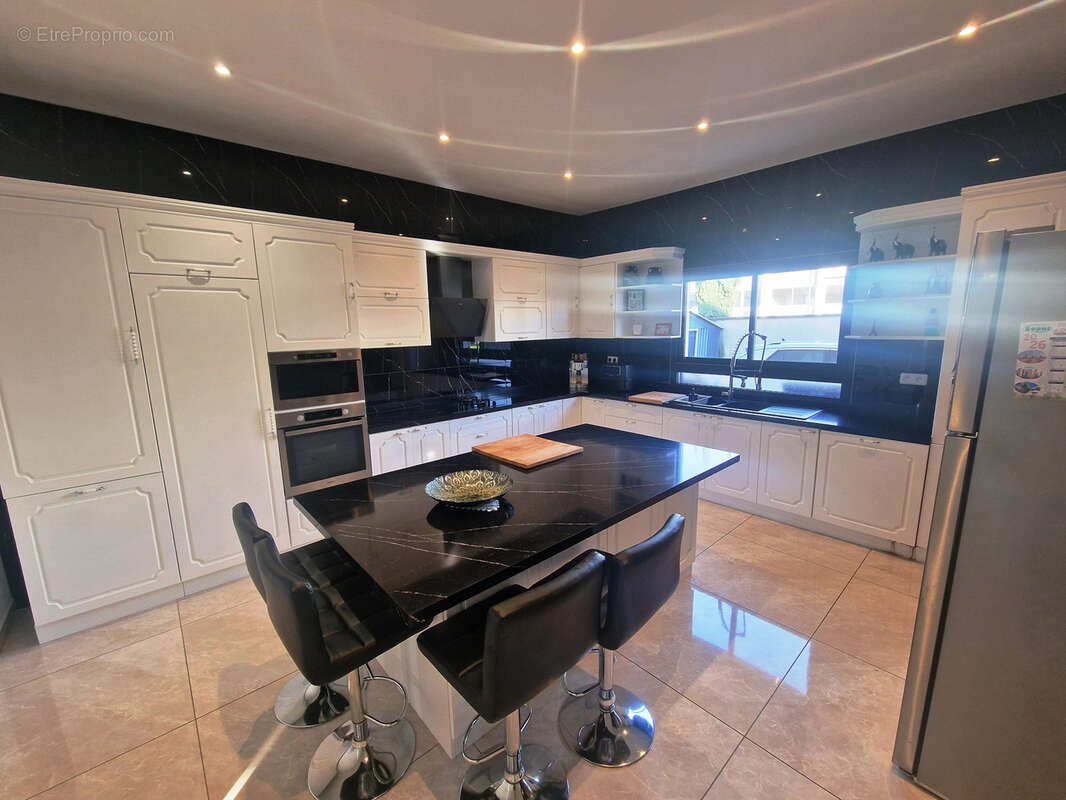 Maison à AUBERGENVILLE