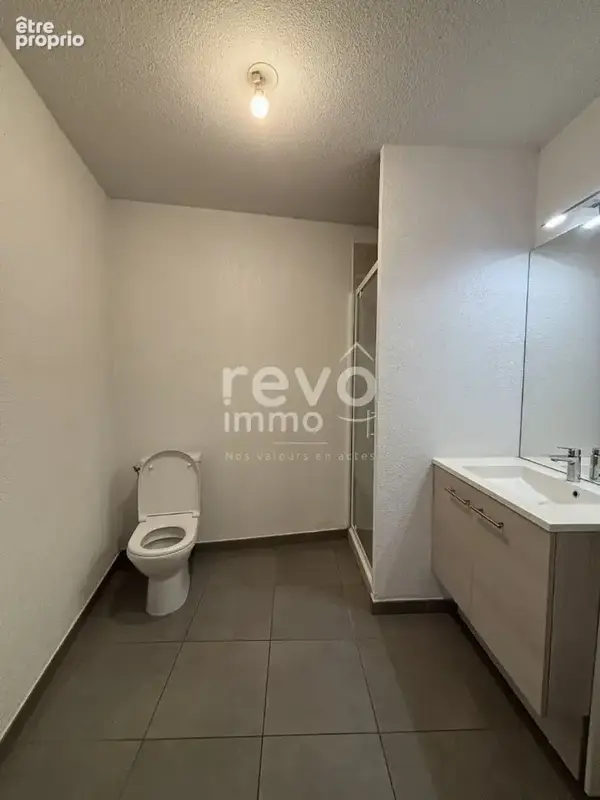 Appartement T2 de 40m² + 19m² de terrain - photo 6