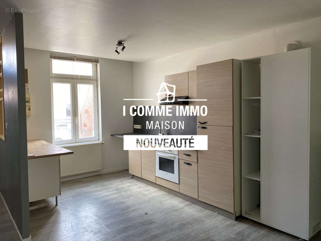 Photo 2 - Maison à AIX-NOULETTE