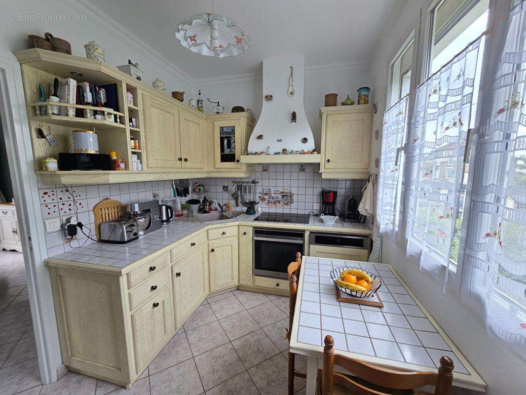 Maison individuelle avec 4 chambres, véranda et magnifique jardin - 175 M2 utiles - photo 9