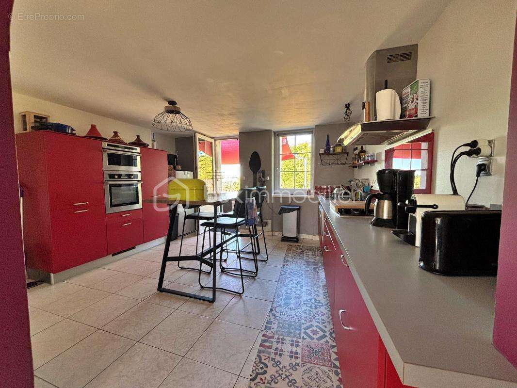 Découvrez le charme d'une maison spacieuse - photo 4