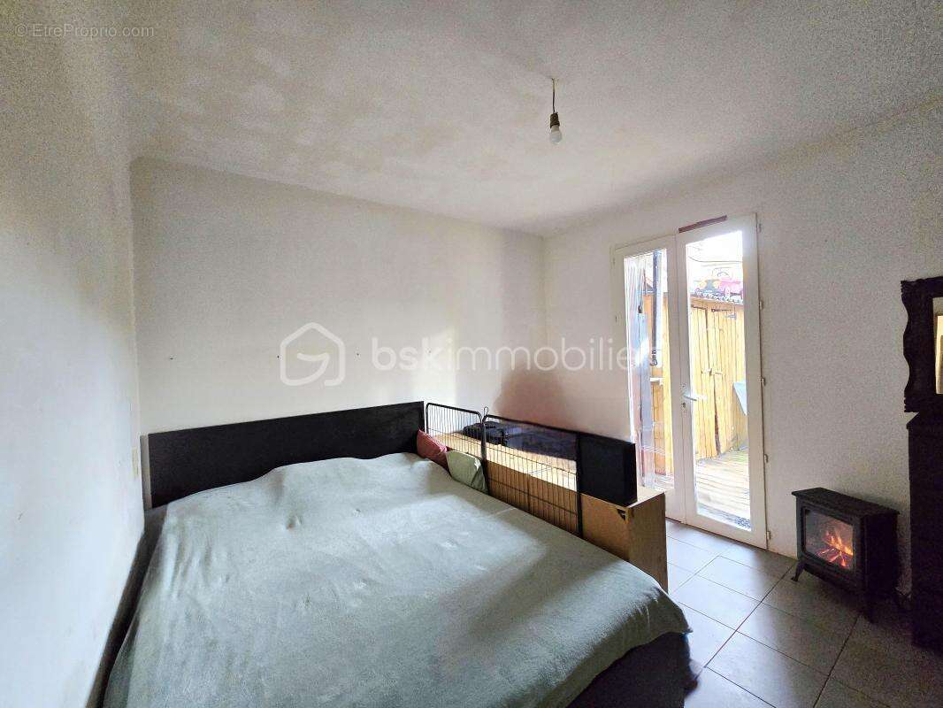 En exclusivite - rez-de-chaussee- centre-ville - photo 5