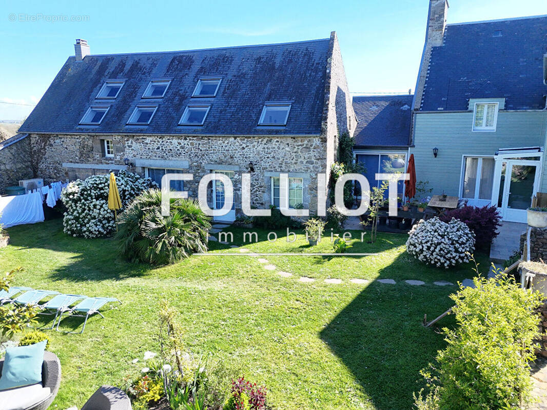 Maison à AGON-COUTAINVILLE