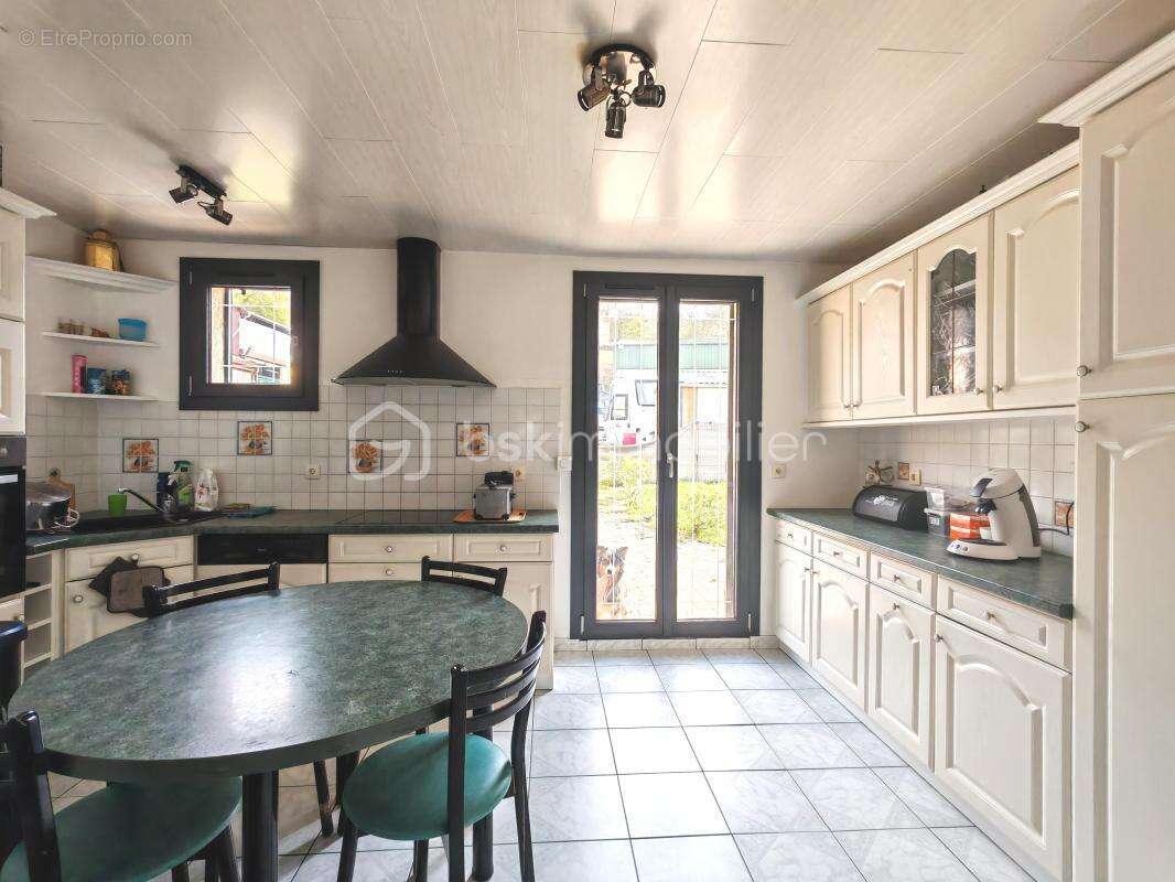 Maison avec sous sol total et jardin - photo 4