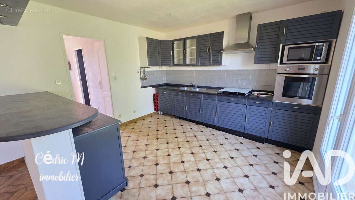 Maison 100 m² à Val-De-Reuil  - photo 6