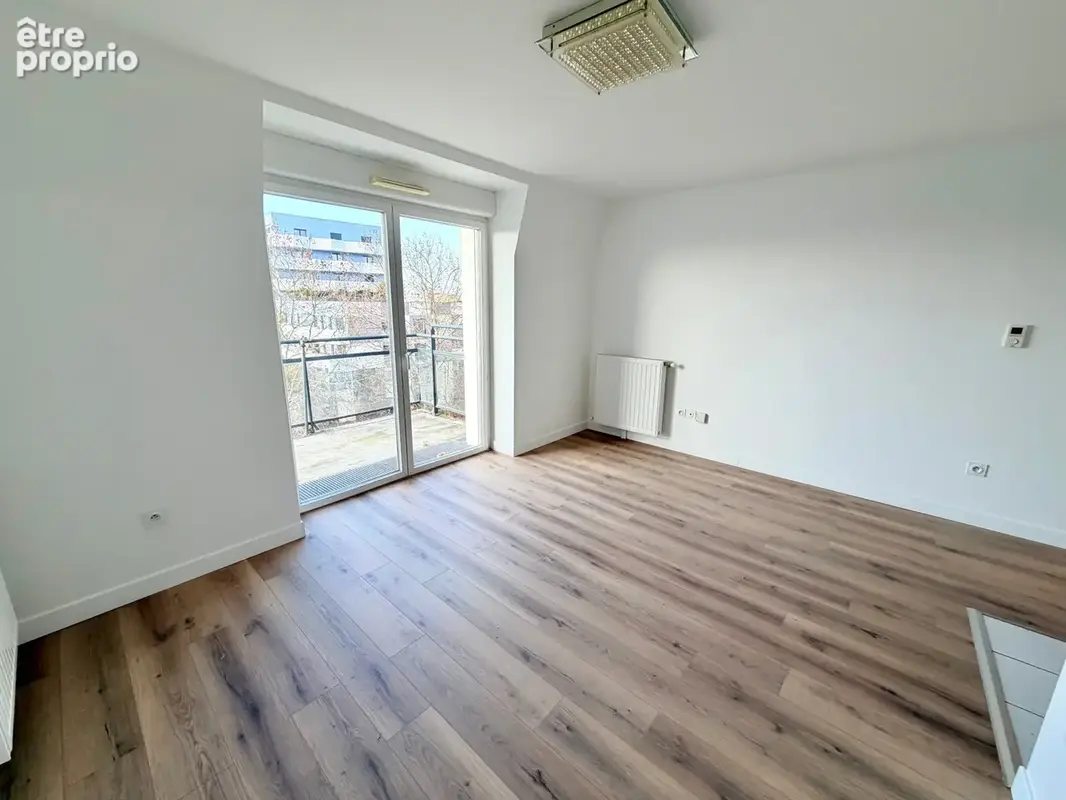 Rue Étienne Dolet  Exclusivité — Appartement rénové en dernier étage avec balcon - photo 2