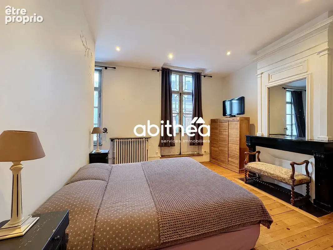 Maison en pierres blanches avec garage et extérieur - photo 13