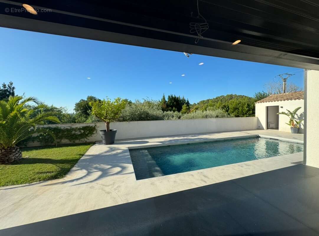 Maison à LAUDUN-L'ARDOISE