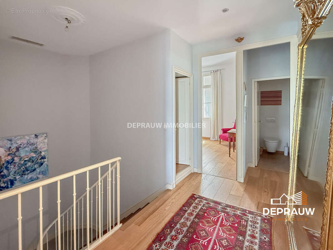 Élégante demeure de caractère de 160 m2 avec jardin arboré de 100 m2 - photo 12