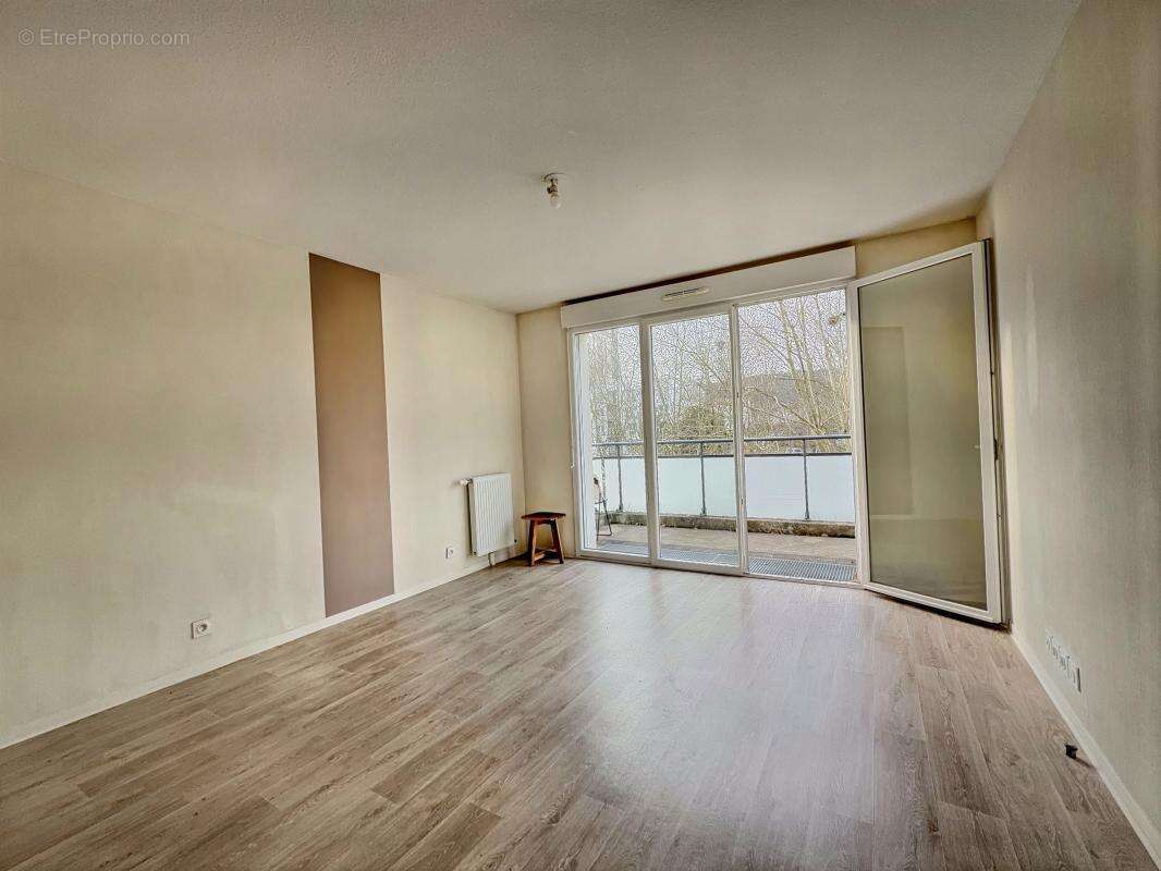 Appartement T2 avec balcon et place de parking en sous-sol, rare DPE : A - photo 4