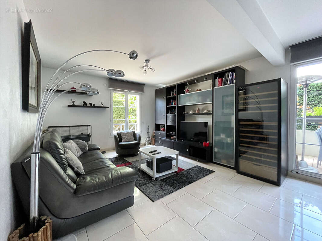 Appartement en rez-de-jardin avec garage, parking, cave, terrasse et jardin - photo 6