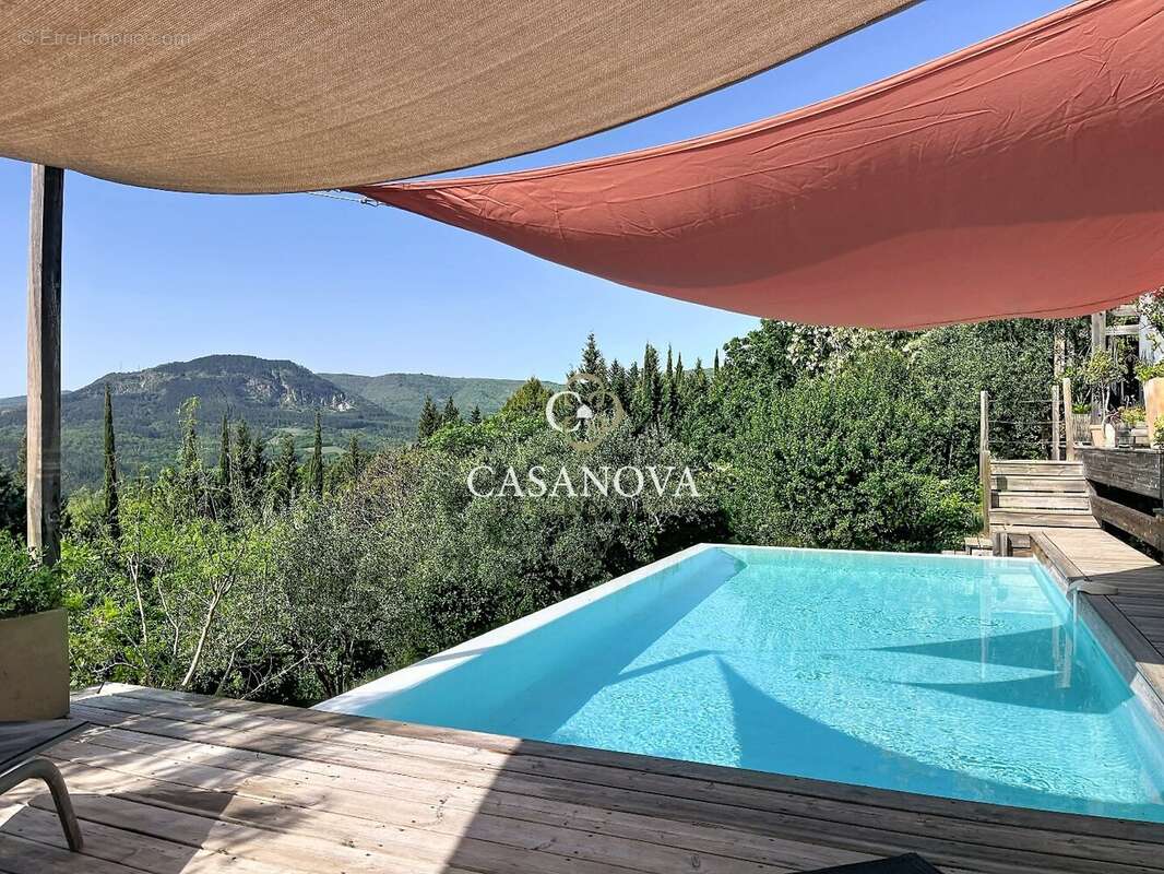 Villa d'architecte contemporaine avec piscine à débordement chauffée et vue panoramique exceptionnelle sur les hauteurs de Lodèv - photo 16