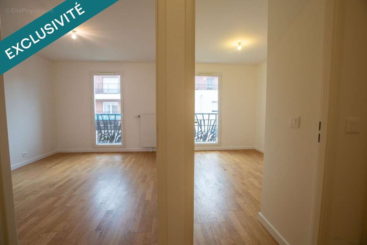 Photo 8 - Appartement à VOISINS-LE-BRETONNEUX