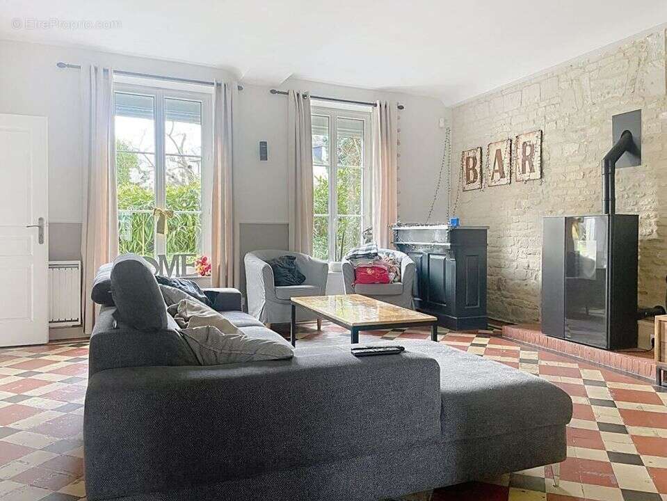 Maison à LOUVIGNY