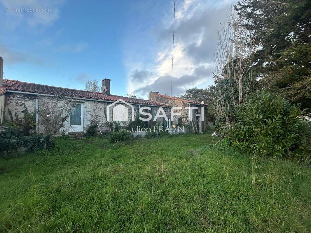 Photo 1 - Maison à SAINT-JULIEN-DE-CONCELLES