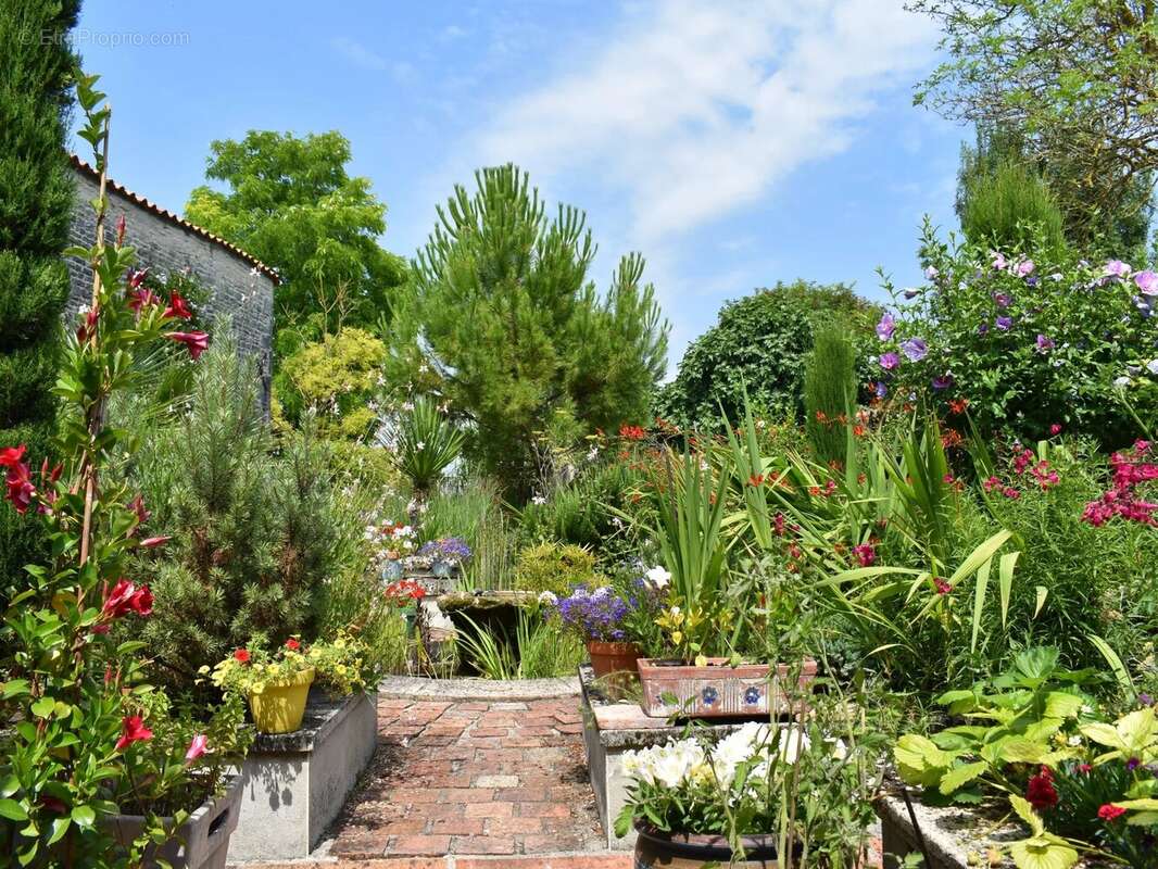 Maison à COURBILLAC