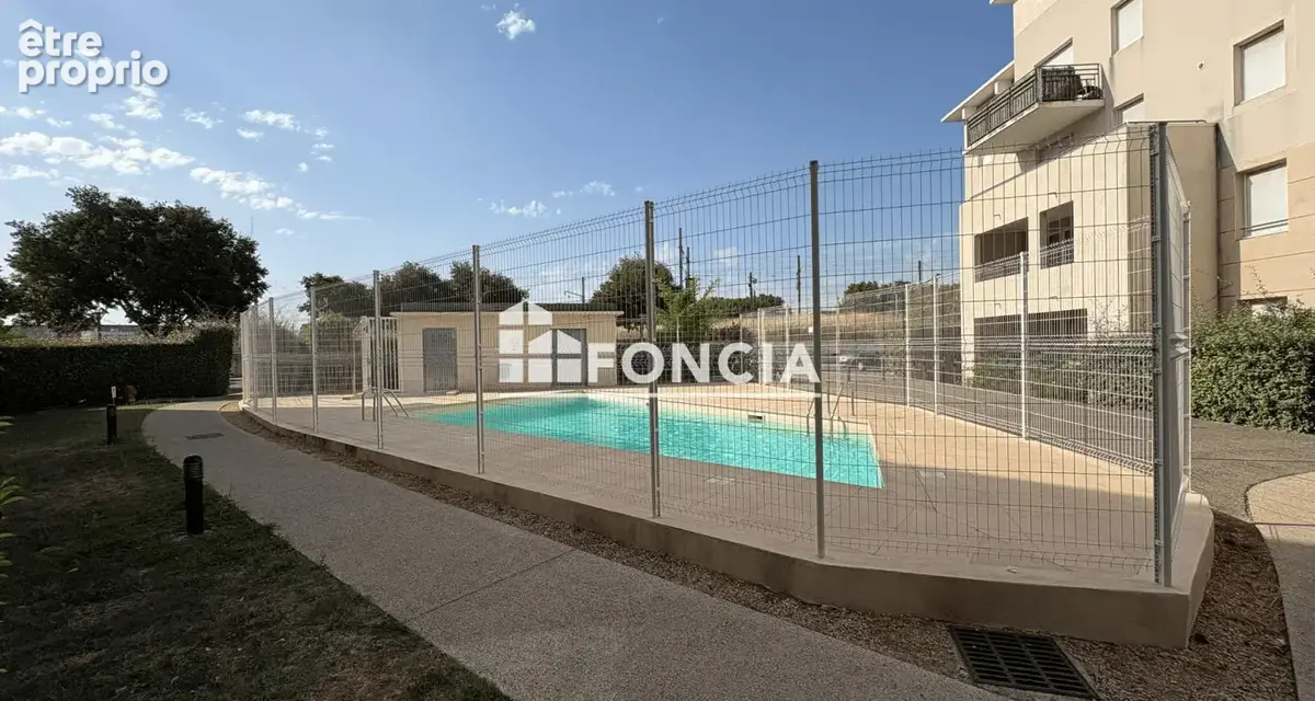 Appartement proche du centre-ville, environ 85 m², résidence avec piscine sécurisée - photo 9