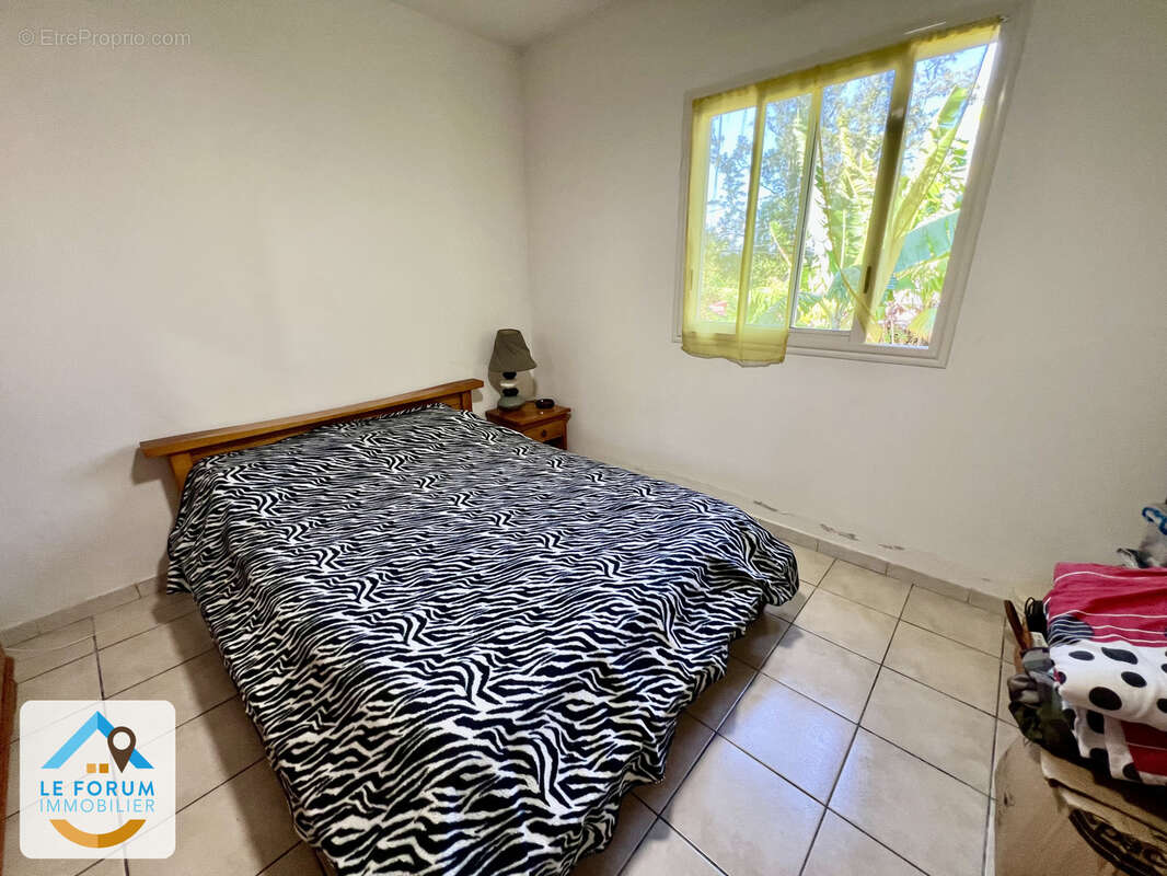 Saint joseph 97480 - villa f3 + bureau -  varangue ouverte - terrain plat et cloture - secteur recherché - photo 3