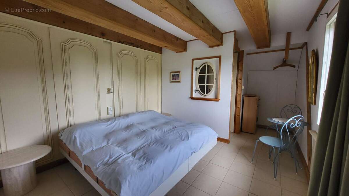 24410 Maison  atypique  sur 2 niveaux entre Riberac  et Saint Aulaye parcelle de  4ha et un étang - photo 17