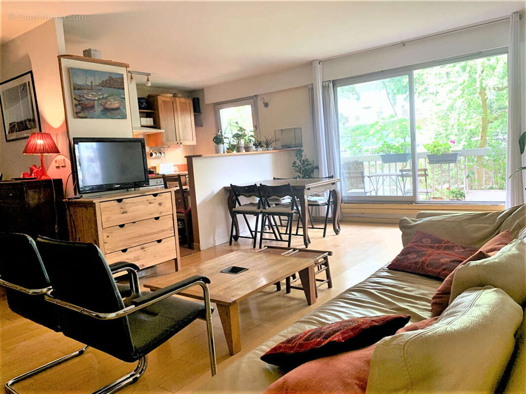 Appartement  4 pièce(s) 93m² + Cave +2 Parkings - photo 2