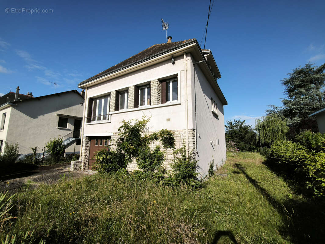 Maison sur sous-sol de 118 m2 avec jardin de 1076m2 en plein centre - photo 16