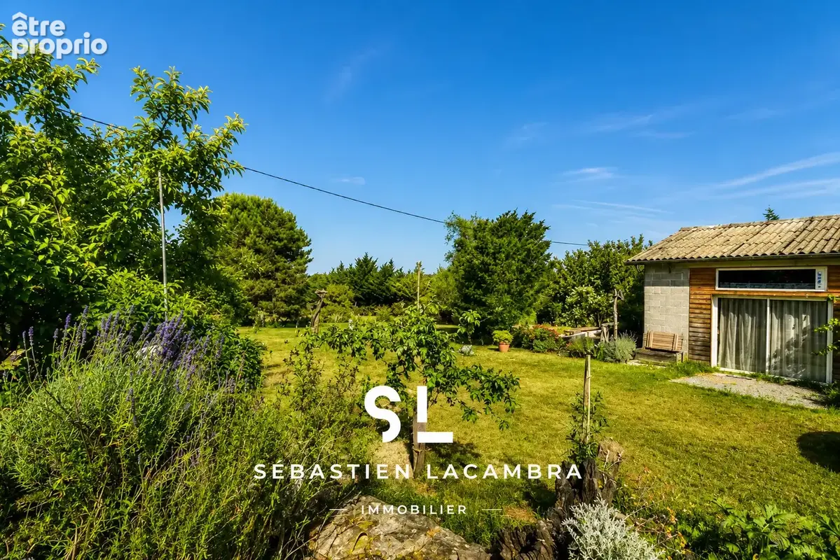 Maison en pierre rénovée   Dépendances et studio indépendant   Terrain arboré 1 626 m2 - photo 19
