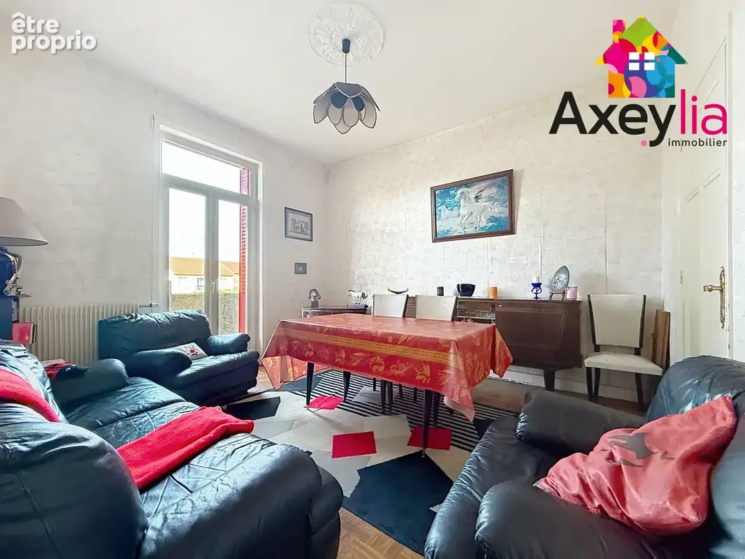 A vendre - riorges - maison élevée sur sous-sol avec deux chambres, garage, terrasse et terrain - photo 6