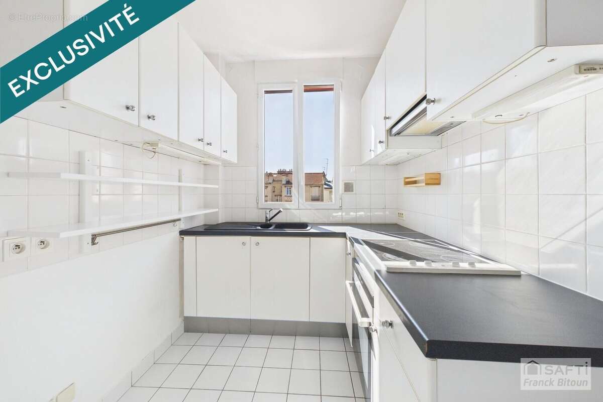 Photo 6 - Appartement à COURBEVOIE