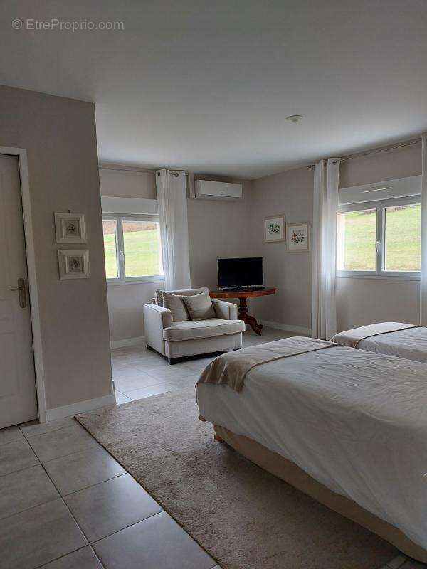 Maison à SAVIGNE-L'EVEQUE