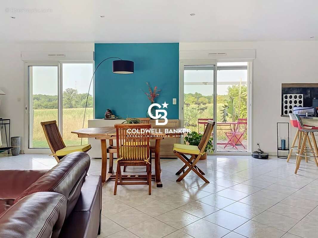 Maison de plain-pied avec garage et jardin et Saintes - photo 2