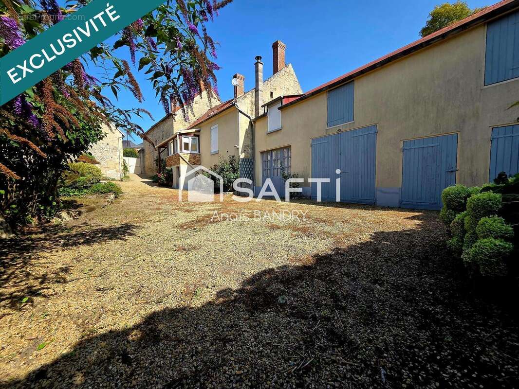 Photo 2 - Maison à BOURG-ET-COMIN