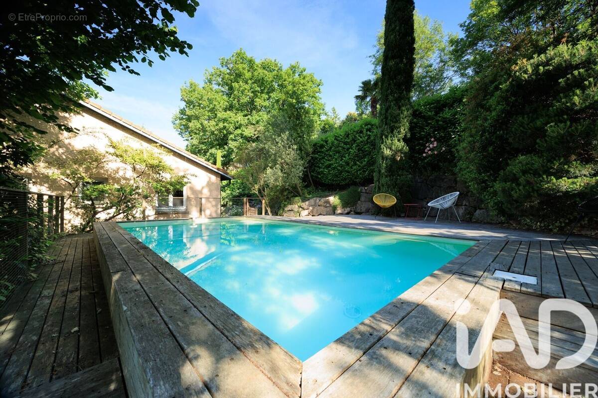 Photo 1 - Maison à SAINT-GENIS-LES-OLLIERES