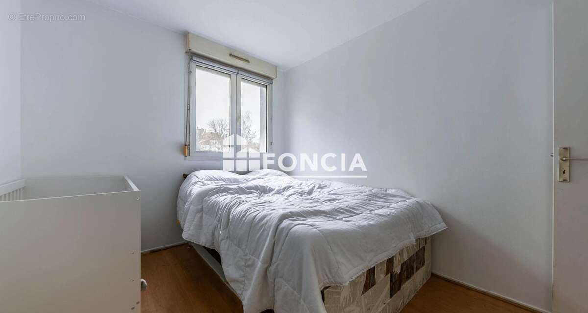 EXCLUSIVITE FONCIA -  Spacieux trois pièces avec balcon et parking intérieur - photo 9